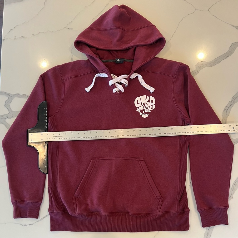 Maroon Hooded Lace-Up Sweatshirt with Skull Graphic